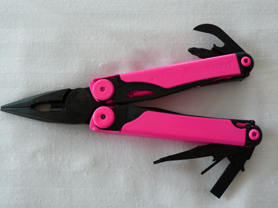 Hot pink powdercoated Leatherman front view pliers with tools spread